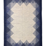 Indra Rekha – Hand Woven Wool Rug in Indigo/Cream