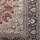 Nivara - Hand Knotted Wool Rug in Rust/Ivory