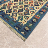 Aazaan – Handwoven Cotton Rug in Blue/Yellow