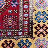 Kapadokya – Hand Knotted Wool Rug in Maroon/Brown