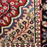 Gul-Mirvarid – Hand Knotted Wool Rug in Rust/Navy Blue