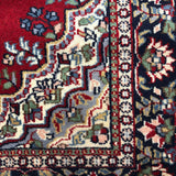 Mahroun – Hand Knotted Wool Rug in Red/Navy Blue