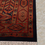 Khoran – Hand Knotted Wool Rug in Navy Blue/Rust