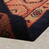 Khoran – Hand Knotted Wool Rug in Navy Blue/Rust