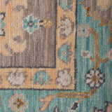 Neelzohra – Hand Knotted Wool Rug in Slate Grey/Turquoise Blue