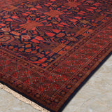 Zorayan – Hand Knotted Wool Rug in Ink Blue/Orange Rust
