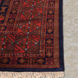 Zorayan – Hand Knotted Wool Rug in Ink Blue/Orange Rust