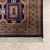 Konya – Hand Knotted Wool Rug in Navy Blue/Rust