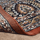 Nivara - Hand Knotted Wool Rug in Rust/Ivory