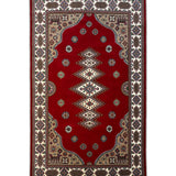 Aksaran – Hand Knotted Wool Rug in Red/Cream