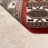 Aksaran – Hand Knotted Wool Rug in Red/Cream