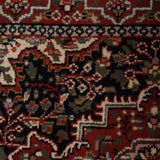 Nayestan – Hand Knotted Wool Rug in Navy Blue/Maroon