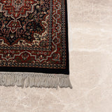 Nayestan – Hand Knotted Wool Rug in Navy Blue/Maroon