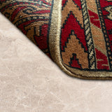 Rangrez Riwaaz – Hand Knotted Wool Rug in Red/Peach