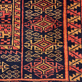 Kohsaran – Hand Knotted Wool Rug in Navy Blue/Rust