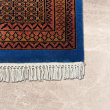 Lithchi – Hand Knotted Wool Rug in Turquoise Blue/Brown