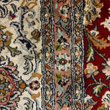 Rangrezan – Hand Knotted Silk Rug in Deep Red/Ivory