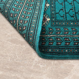 Zarrinab – Hand Knotted Wool Rug in Turquoise Blue/Black