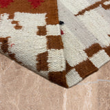 Aanya Bagh – Hand Woven Wool Rug in Cream/Brick Red