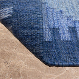 Indra Rekha – Hand Woven Wool Rug in Indigo/Cream