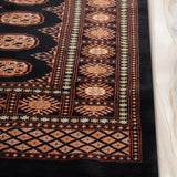 Leyla - Handknotted Wool Rug in Dark Blue/Peach