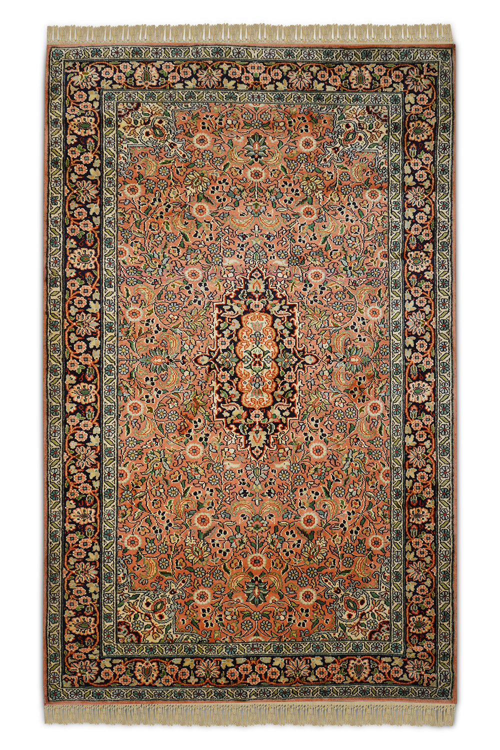 A beautifully handcrafted Kirman Persian rug featuring intricate floral motifs, delicate arabesques, and a captivating central medallion. The warm peach and blue hues create a sense of elegance and serenity, making it a perfect addition to any living space.