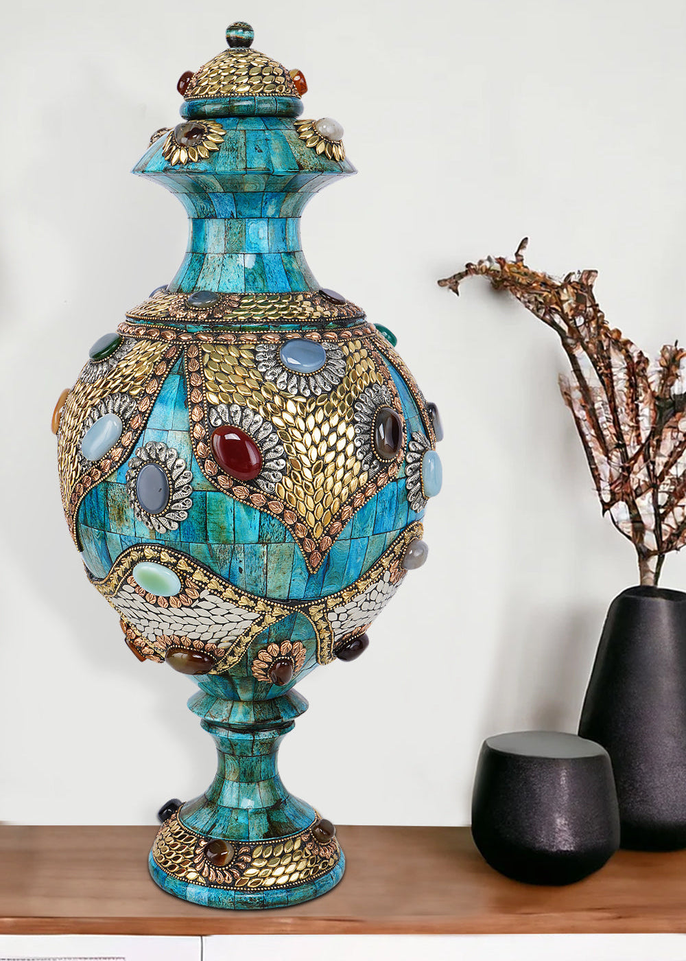 Ornate azure Surahi vase crafted from camel bone with intricate gold-toned metalwork and colorful semi-precious stone embellishments.