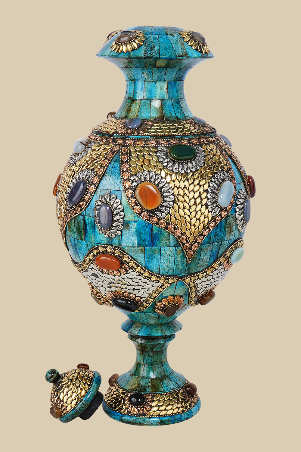 Disassembled azure Surahi vase made of camel bone, showing the main body and the separate, intricately decorated lid with metal and gemstone inlays.
