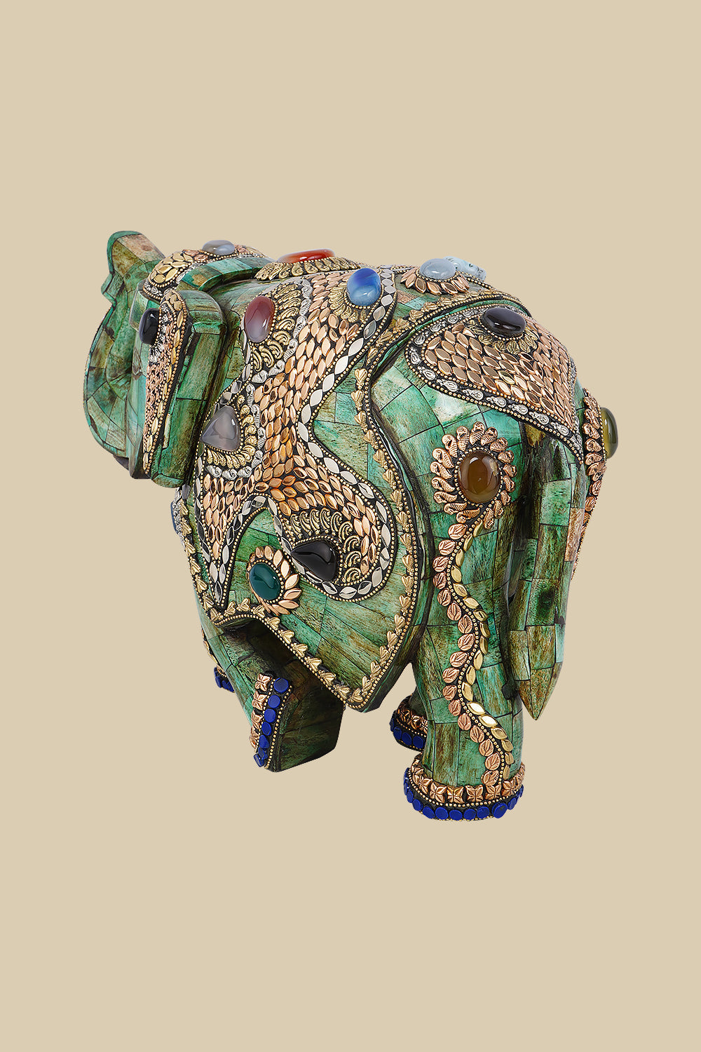 Embellished green elephant art piece crafted from camel bone, featuring detailed gold-colored metalwork and various colorful gemstone inlays.