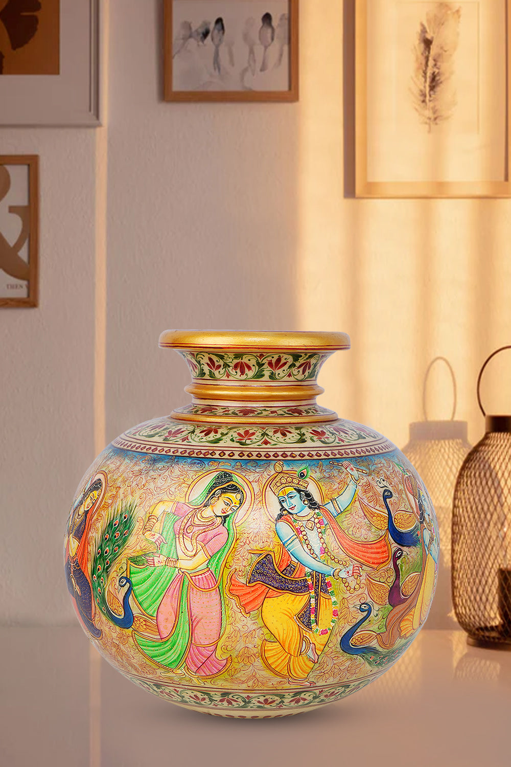 Round marble vase meticulously hand-painted with a vibrant depiction of Lord Krishna dancing with gopis and peacocks, featuring intricate traditional Indian motifs and a decorative neck.
