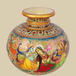 Hand-painted marble flower vase featuring a traditional Indian artwork depicting Radha and Krishna in a romantic setting, surrounded by other figures, peacocks, and lotus blossoms, with intricate decorative patterns.