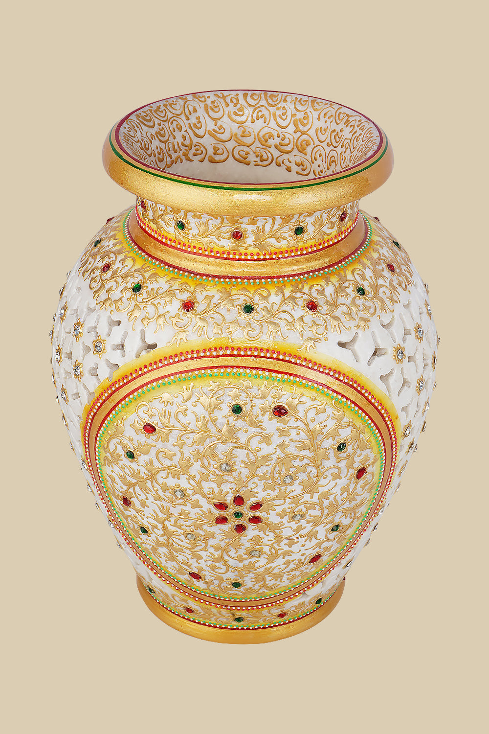 Ornate white marble vase with detailed undercut openwork, hand-painted with golden floral patterns and accented with embedded red and green gemstones.