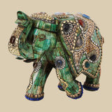 Intricately jeweled green elephant decor crafted from camel bone with detailed gold-tone metalwork and colorful semi-precious stone accents.
