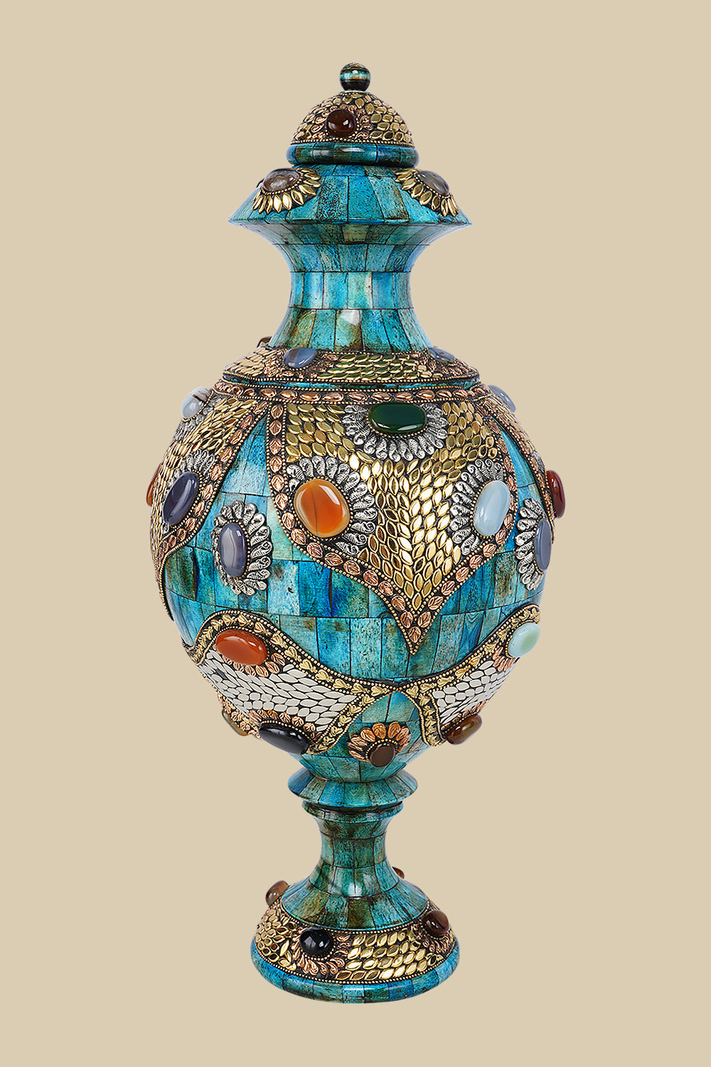 Lidded azure Surahi vase crafted from camel bone featuring intricate gold-toned metalwork and colorful semi-precious stone accents.