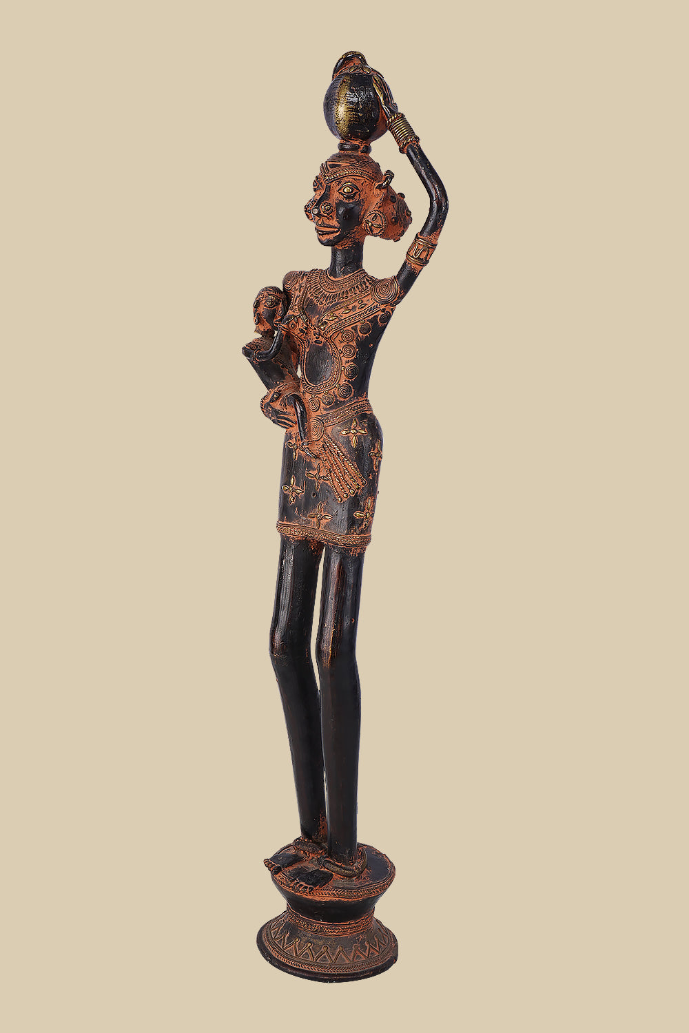 Antique-style dark brass sculpture of a village woman carrying a child on her hip and a water pot balanced on her head, showcasing traditional tribal art and standing on a detailed circular base.