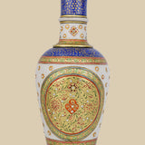 Elegant white marble vase hand-painted in a Mughal-inspired design with intricate floral patterns in red, green, and blue, accented with gold detailing and small embedded stones.