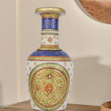 Ornate white marble flower vase meticulously hand-painted with traditional Indian motifs in vibrant blue, red, and green, highlighted with gold accents and small embedded gemstones.
